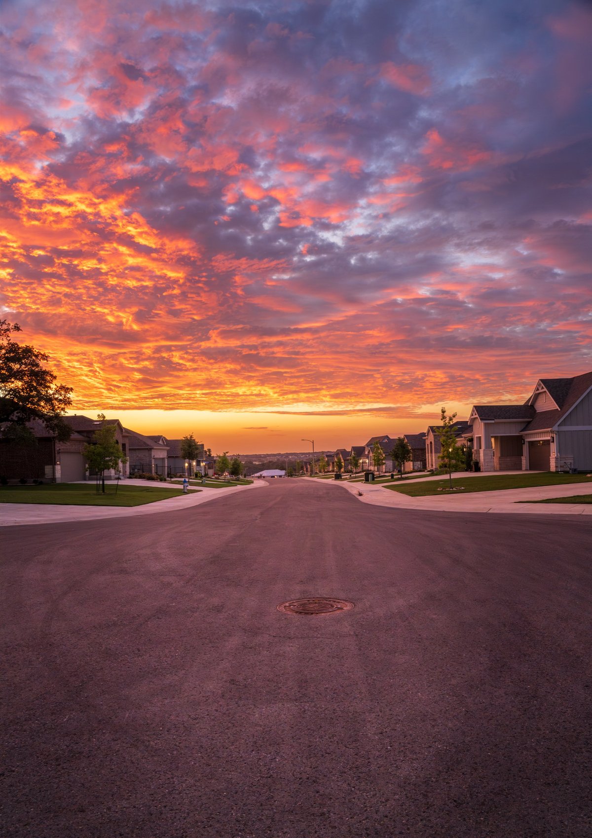 Dramatic sunset seen above over-55 community near Georgetown in Texas