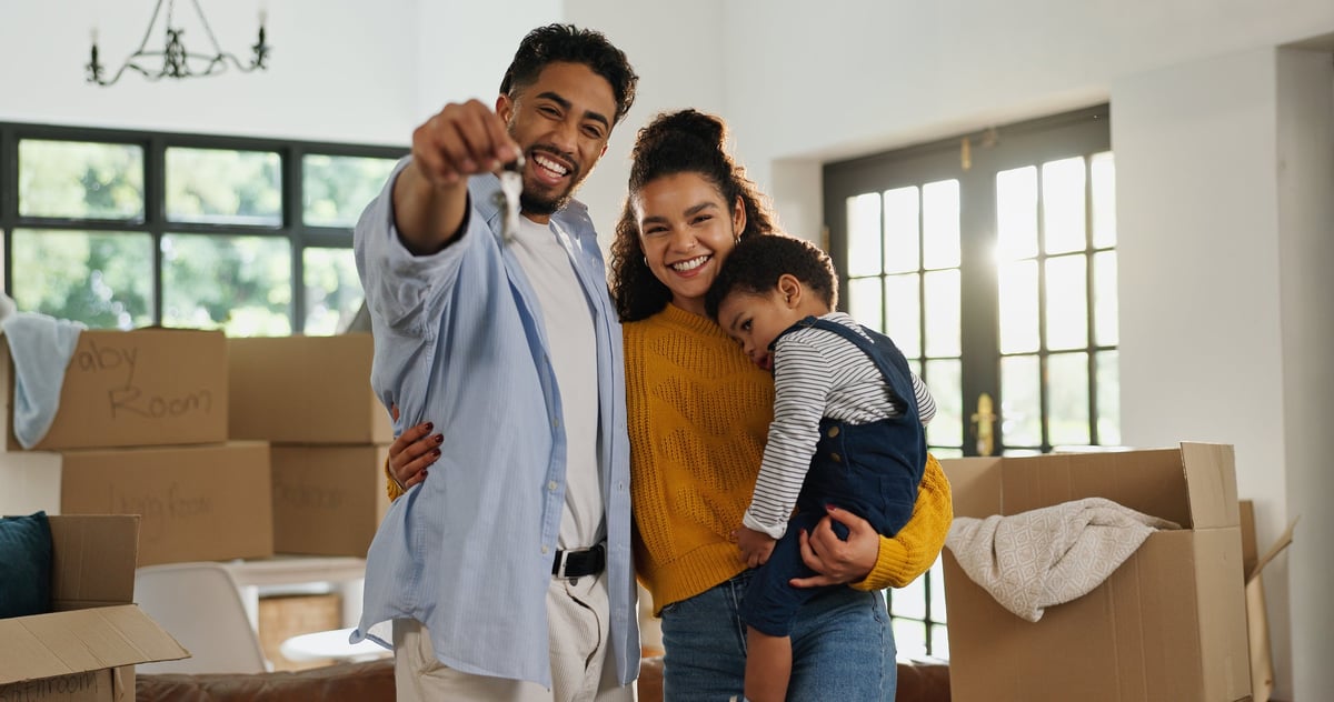 Keys, smile and portrait of family in new home for moving, property investment and security