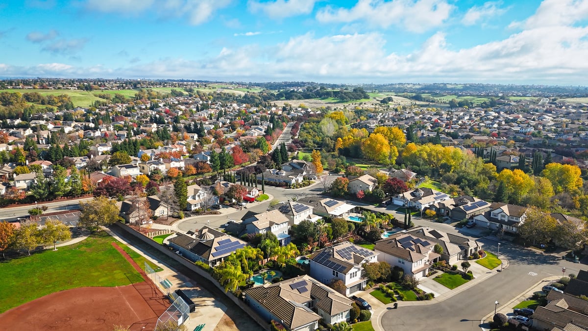 A suburban neighborhood in California from above during fall