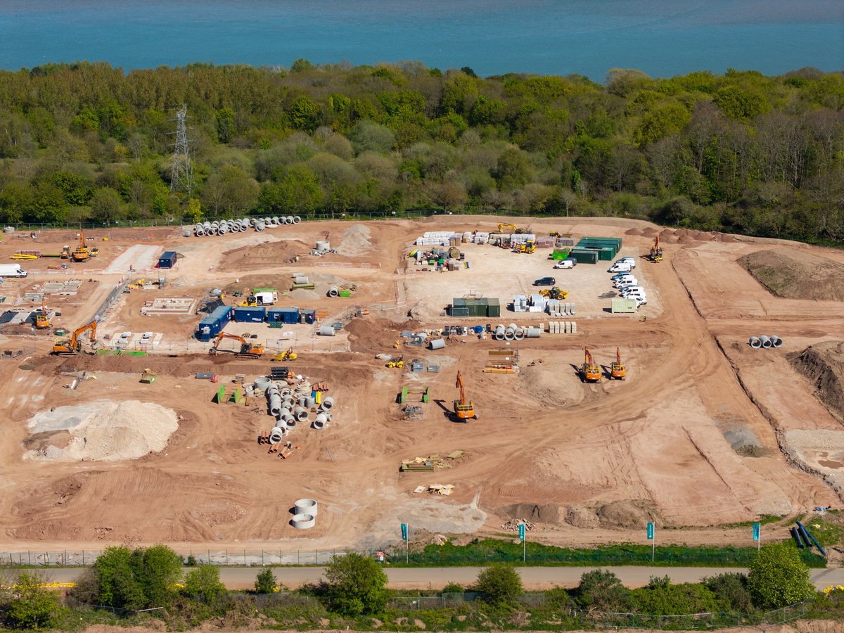 New residential housing development under construction on brownfield site shows building progress