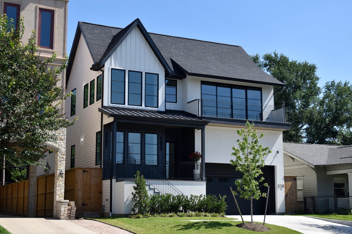 Affluent neighborhood of luxurious modern single-family new construction homes