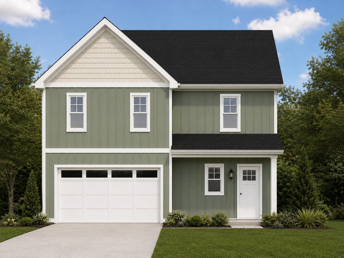 Two-story green and white house with black roof, white garage door, and manicured landscaping