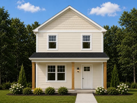 Modern white two-story farmhouse with gabled roof, front porch, and landscaped green yard with hedges and white flowers