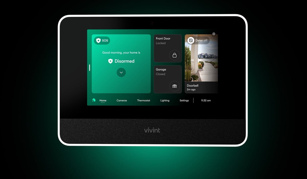 Vivint smart home security system touchscreen display showing disarmed status and front door camera feed