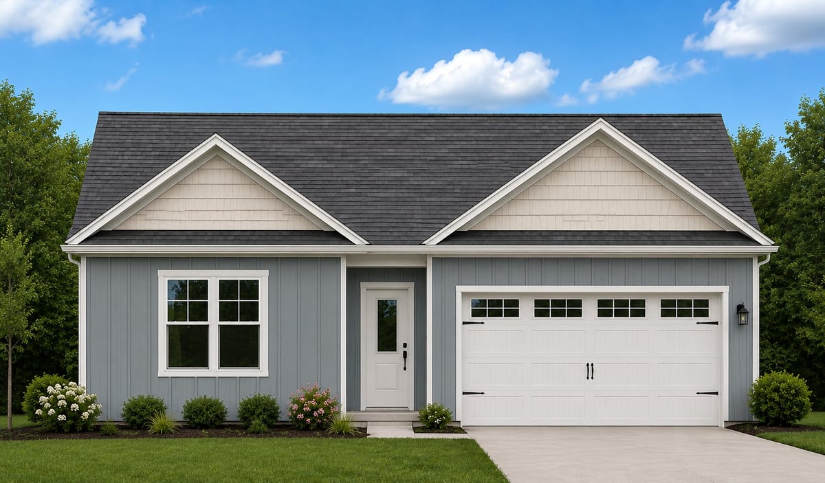 Modern single-story home with gray siding, white trim, two-car garage, and landscaping under blue sky