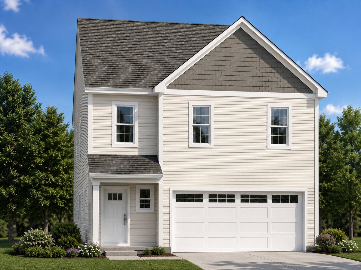 Two-story white house with gray roof, white garage doors, and black shutters surrounded by trees and landscaping